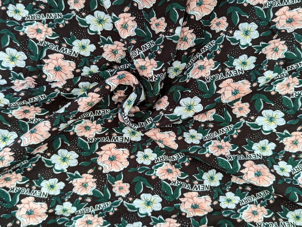 French Terry Everything is possible Blumen auf Dunkelbraun