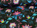 In-house production Cotton Jersey Fluorescent Blossom Magic on Black Fabric by the Meter Dress Fabric