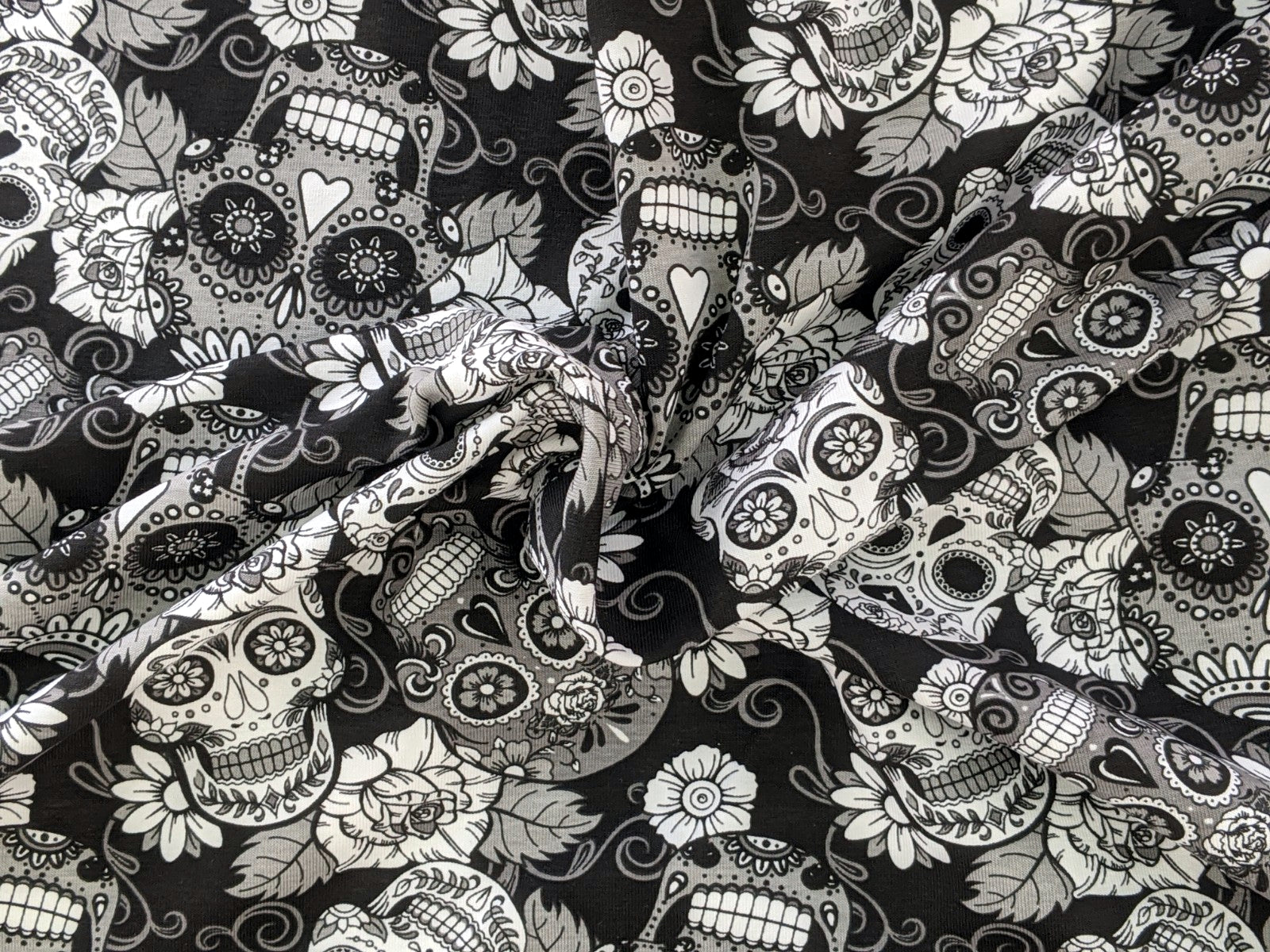 Remnant Cotton Jersey Mexican Skulls with Flowers White/Black 30 x 150 cm