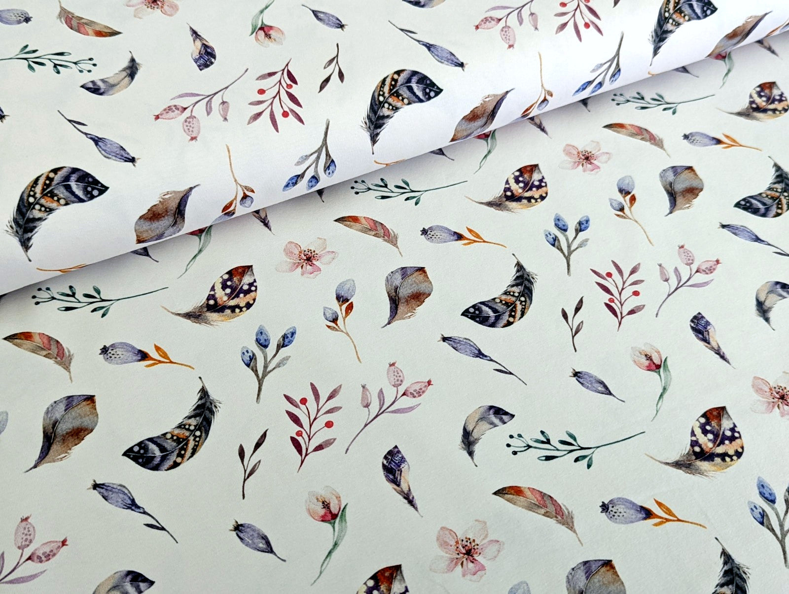 Cotton jersey Small feathers, branches, and cherry blossoms on off-white