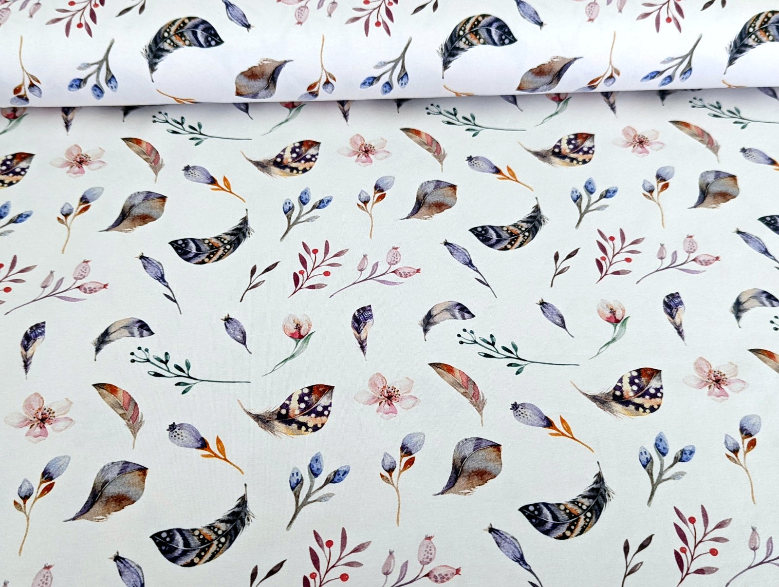 Cotton jersey Small feathers, branches, and cherry blossoms on off-white