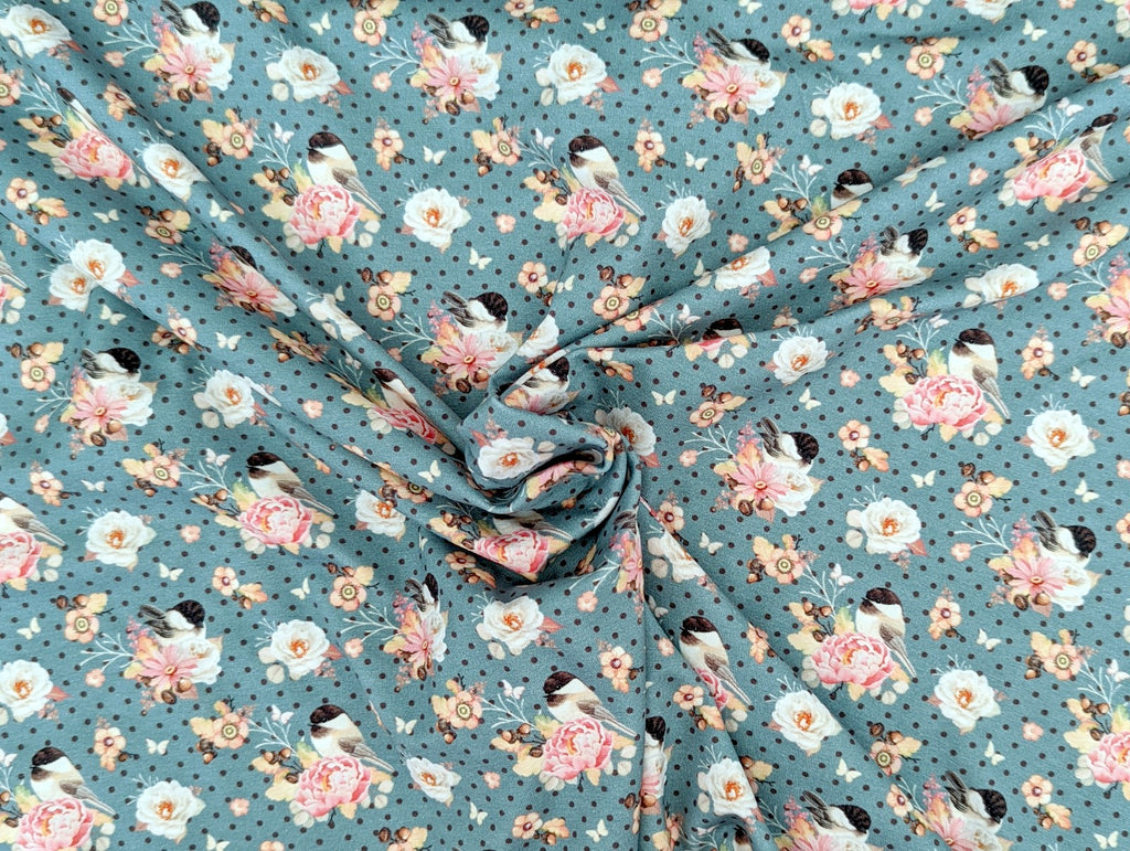 Baumwolljersey Vogel im Blumenzweig auf Punkte Jeansblau
