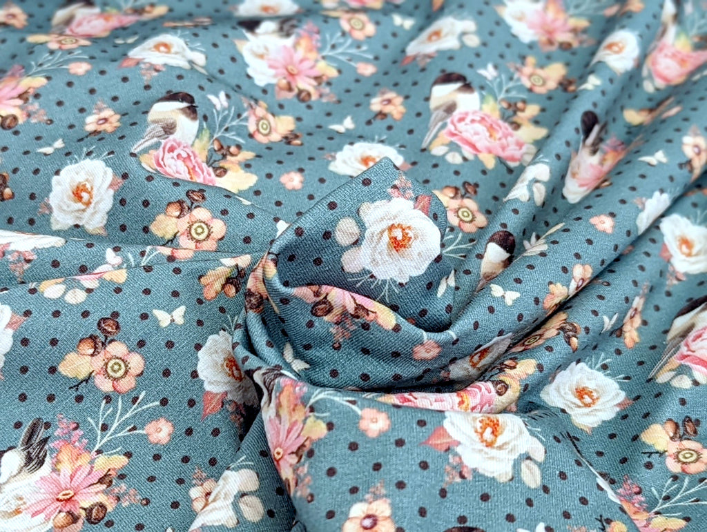 Baumwolljersey Vogel im Blumenzweig auf Punkte Jeansblau
