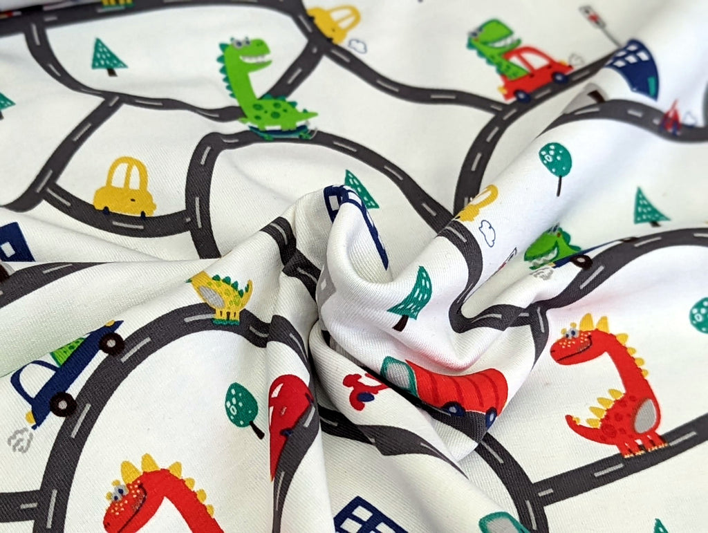 Cotton jersey dinosaur in car on road white