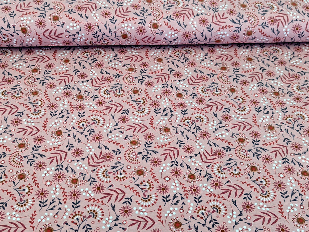 Cotton jersey floral pattern with branches on powder pink