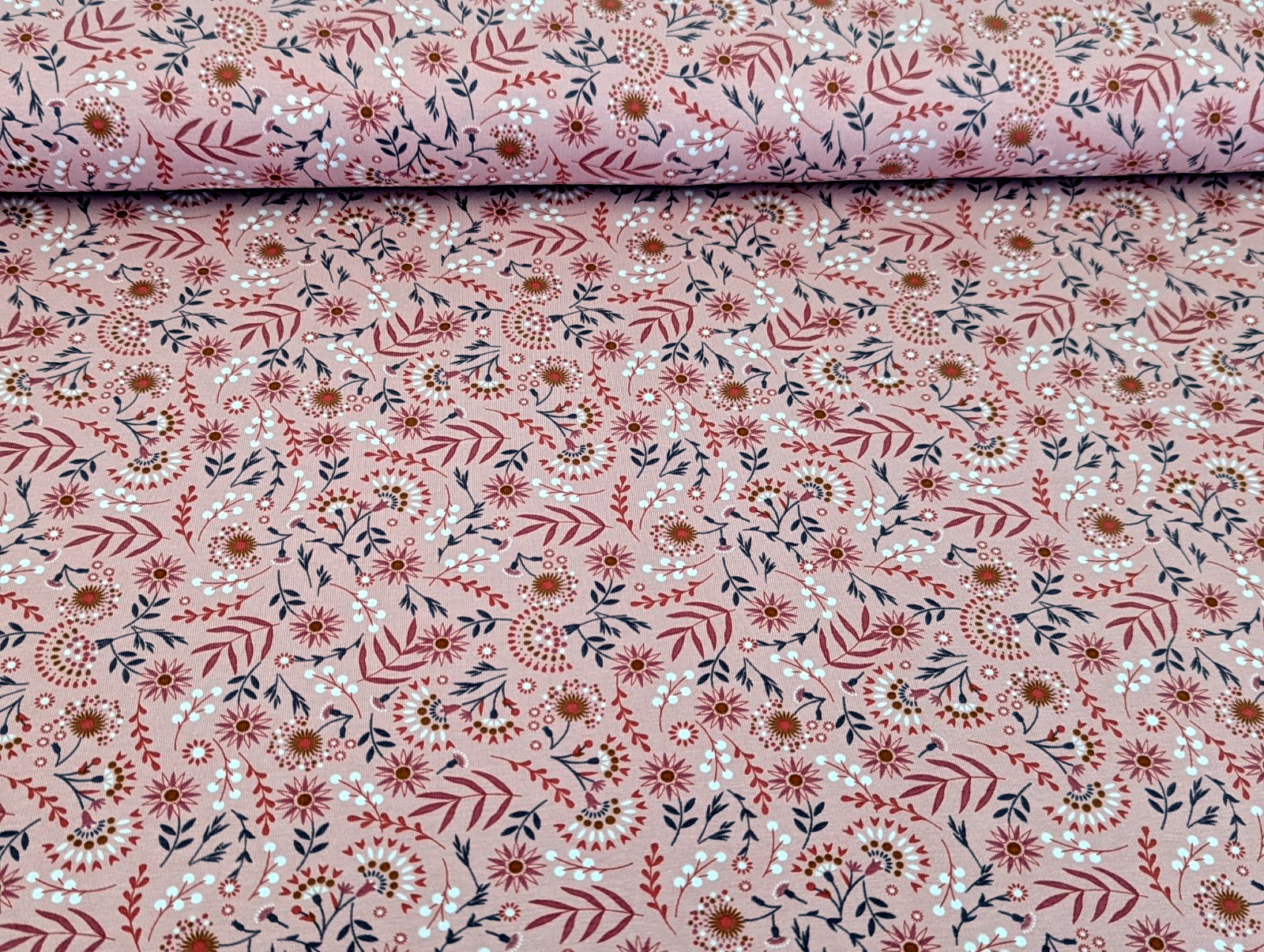 Cotton jersey floral pattern with branches on powder pink