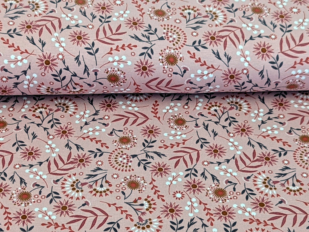 Cotton jersey floral pattern with branches on powder pink