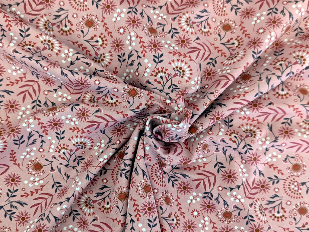Cotton jersey floral pattern with branches on powder pink