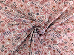 Cotton jersey floral pattern with branches on powder pink