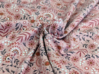 Cotton jersey floral pattern with branches on powder pink