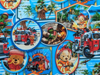 Cotton jersey teddy bear as firefighter bear on blue