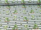 In-house production Cotton Jersey Little Dino on Green