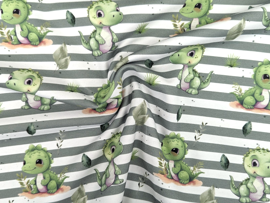 In-house production Cotton Jersey Little Dino on Green