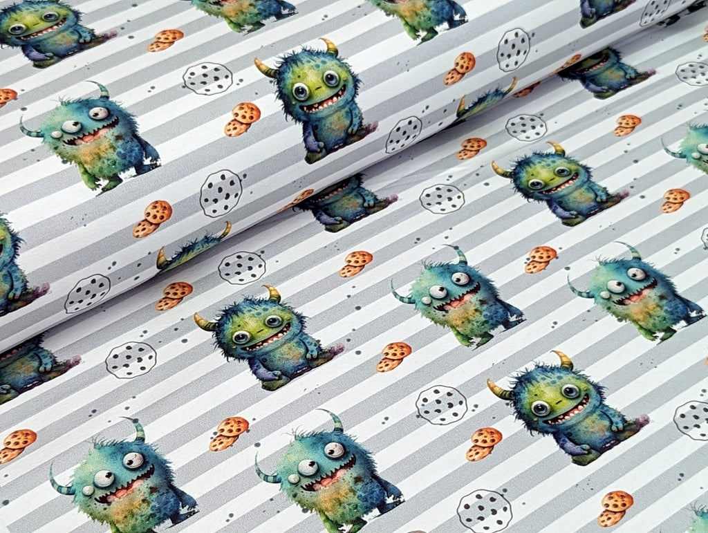 Eigenproduktion Baumwolljersey Kleines Keks Monster auf Streifen Grün / Weiß