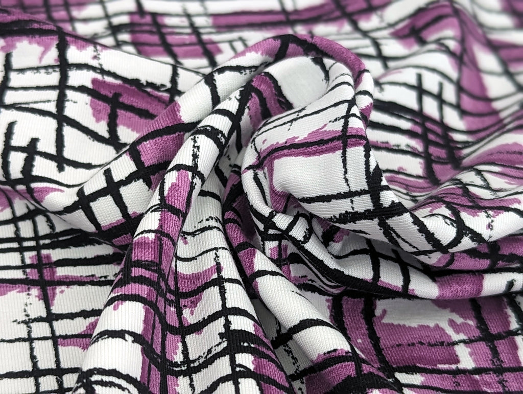 Cotton jersey painting stripes on purple on white