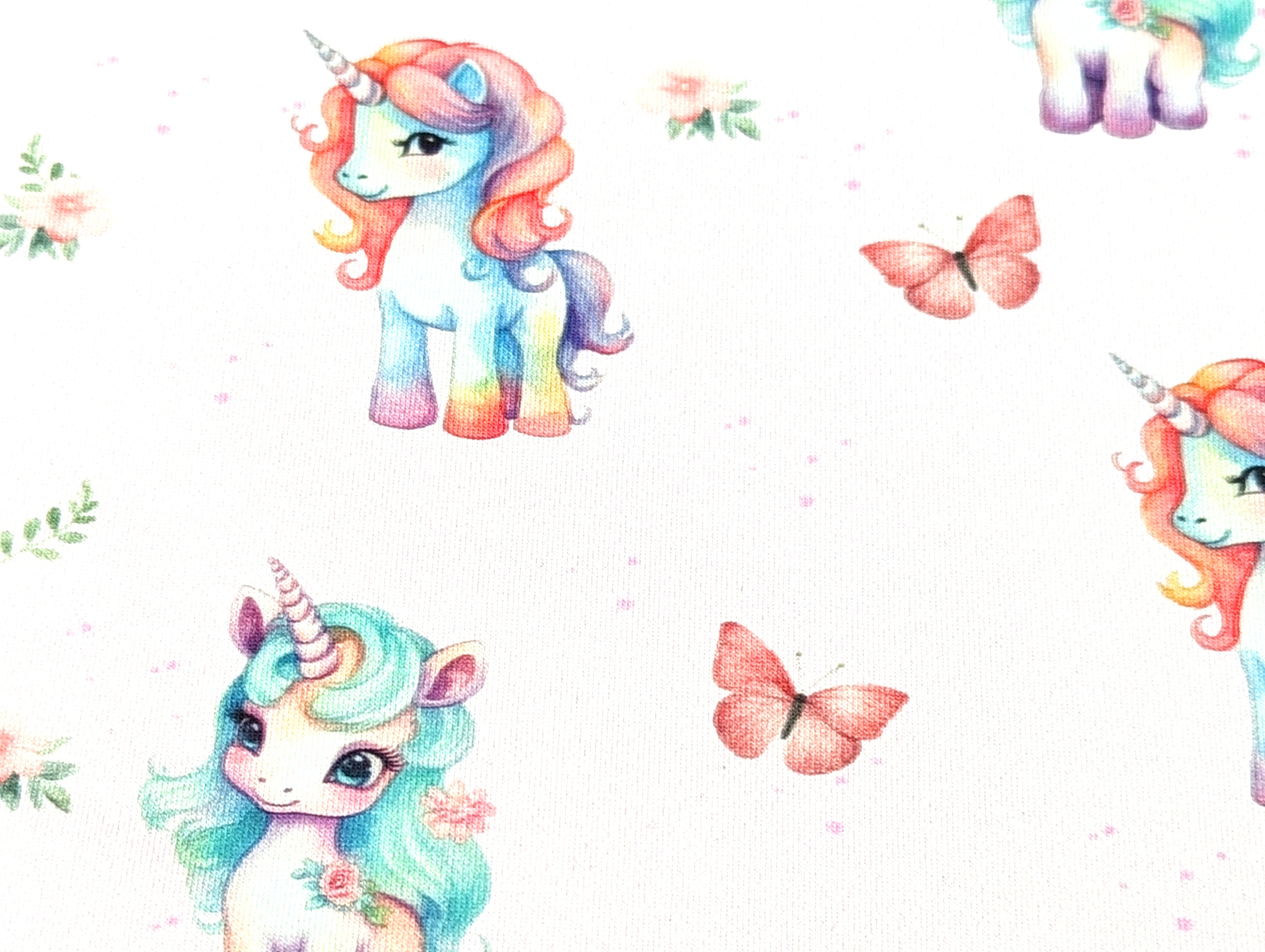 Eigenproduktion Baumwolljersey Regenbogen Unicorn Schmetterling Hellrosa