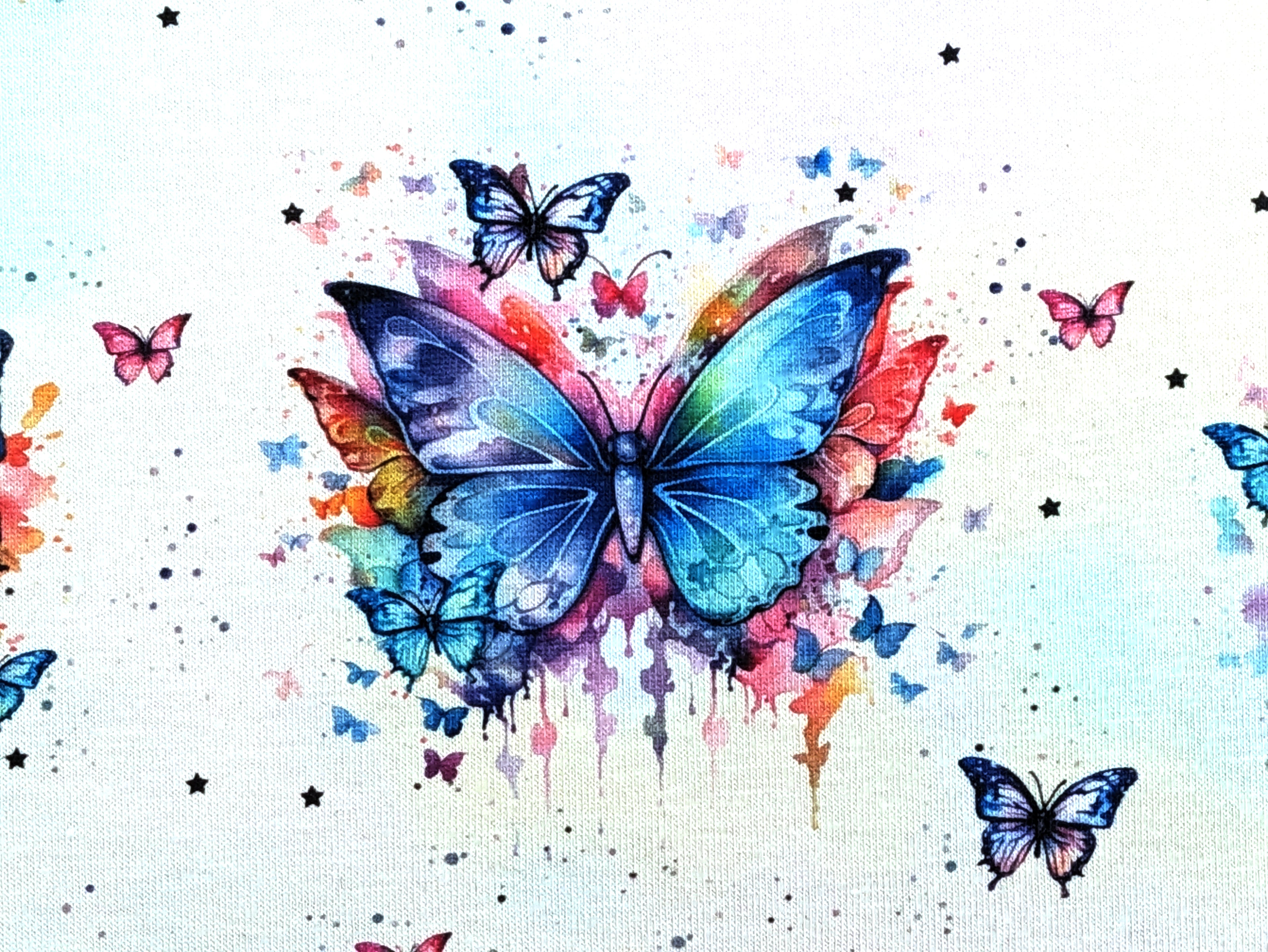 Eigenproduktion Baumwolljersey Regenbogen Schmetterling auf Hellrosa