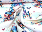 Eigenproduktion Baumwolljersey Regenbogen Schmetterling auf Hellrosa