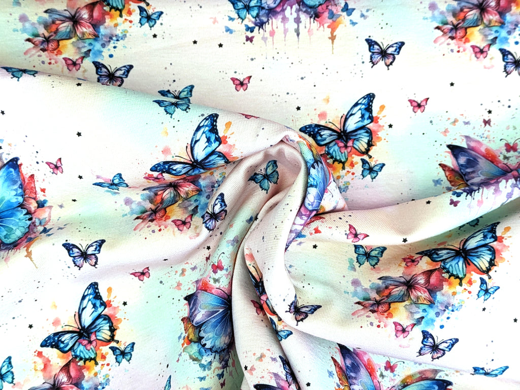 Eigenproduktion Baumwolljersey Regenbogen Schmetterling auf Hellrosa