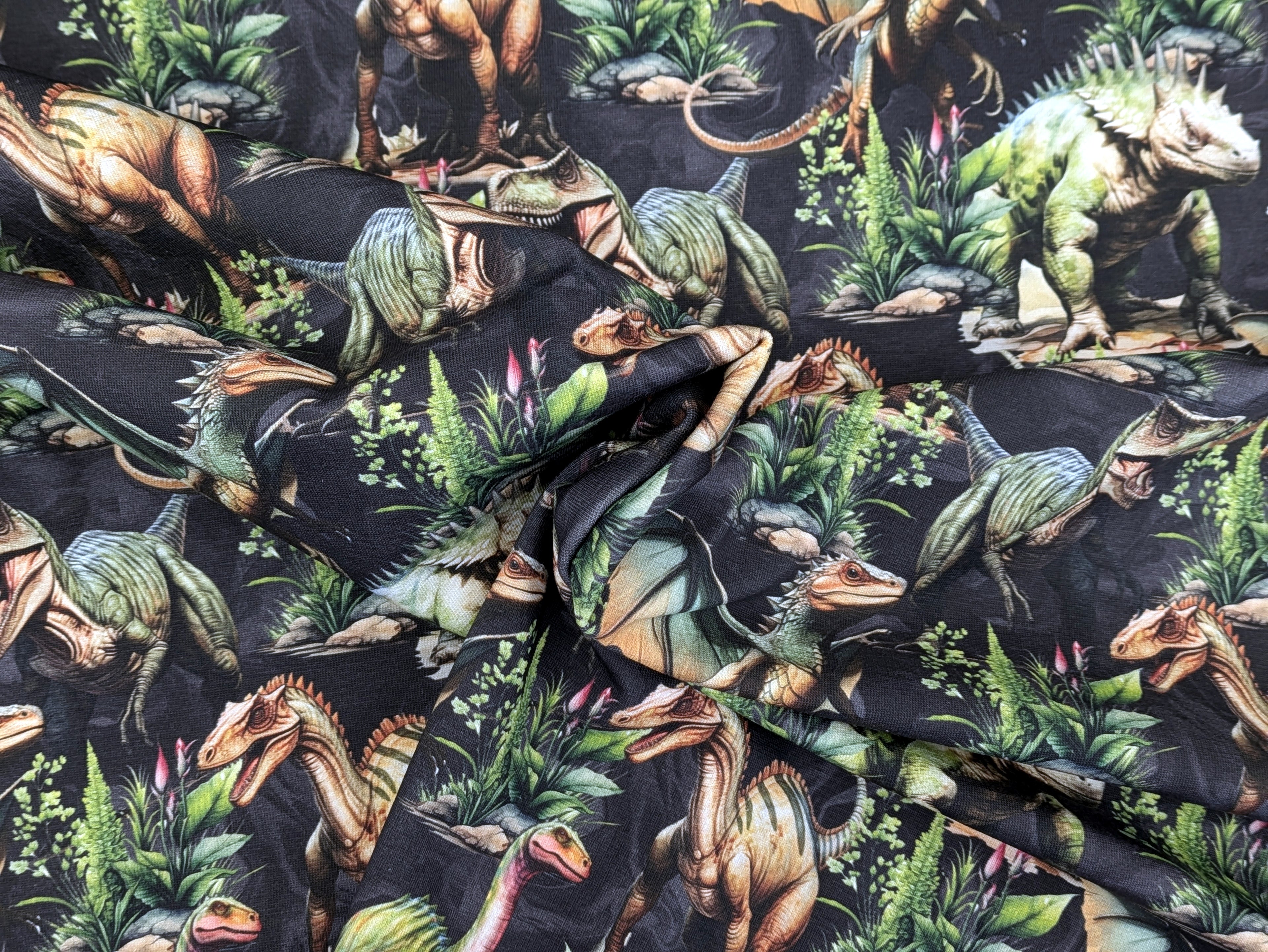 Eigenproduktion Baumwolljersey Dinosaurier Dinos Rex auf Dunkelgrau