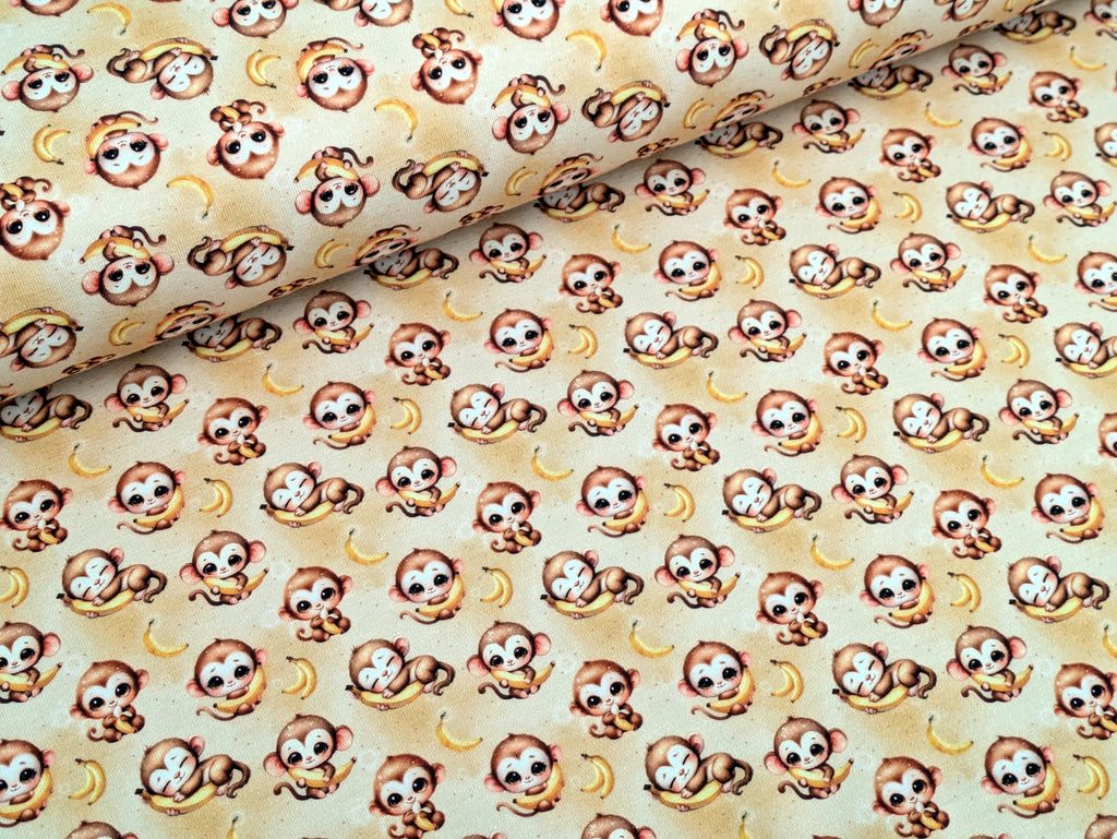In-house production Cotton jersey Baby monkey and his banana on yellow
