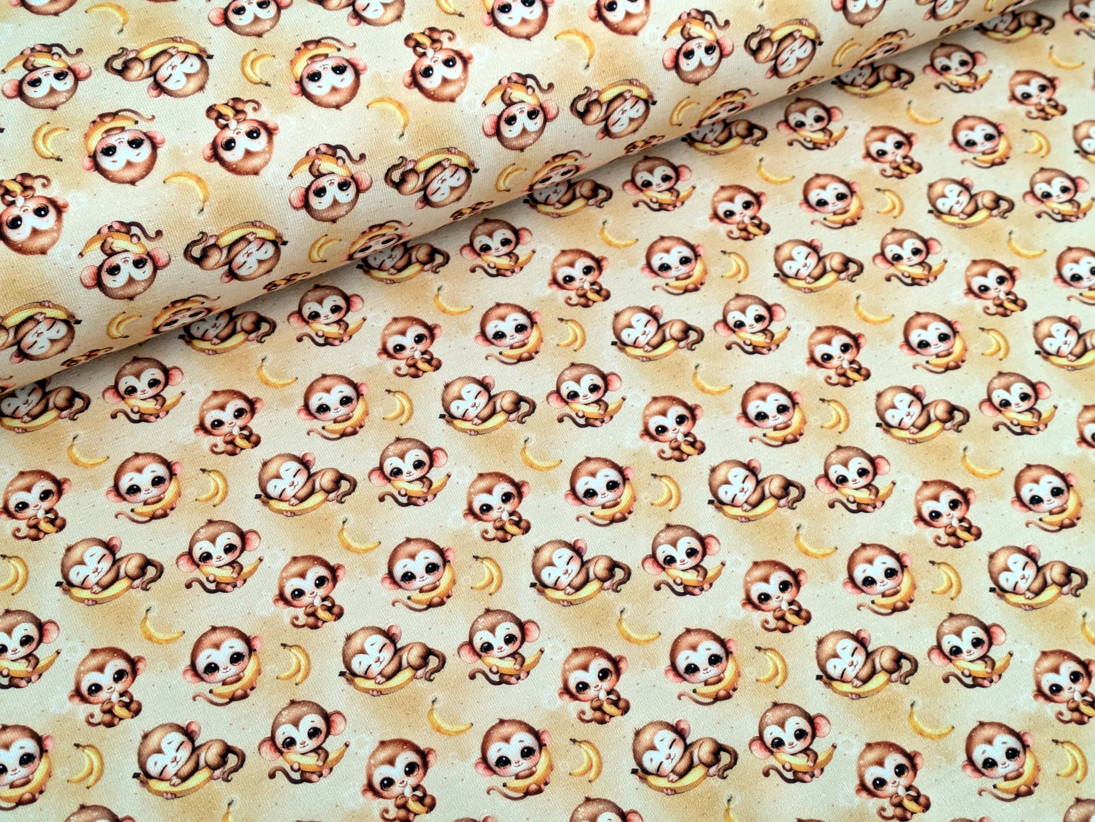In-house production Cotton jersey Baby monkey and his banana on yellow