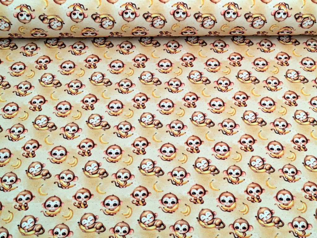 In-house production Cotton jersey Baby monkey and his banana on yellow