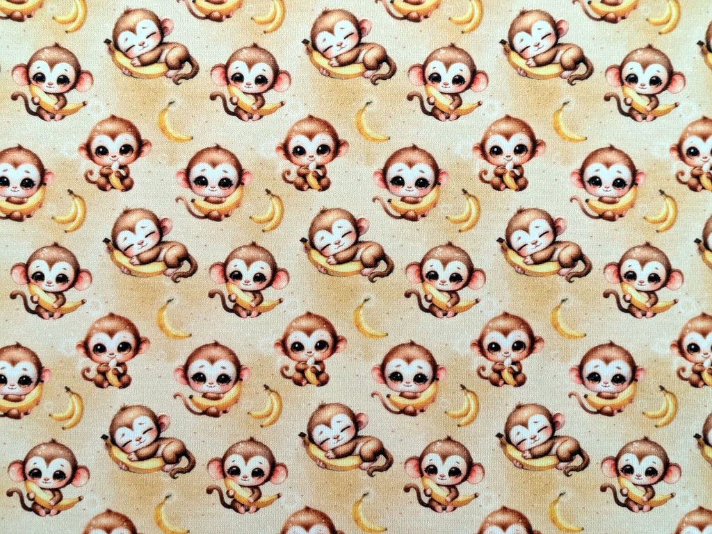 In-house production Cotton jersey Baby monkey and his banana on yellow