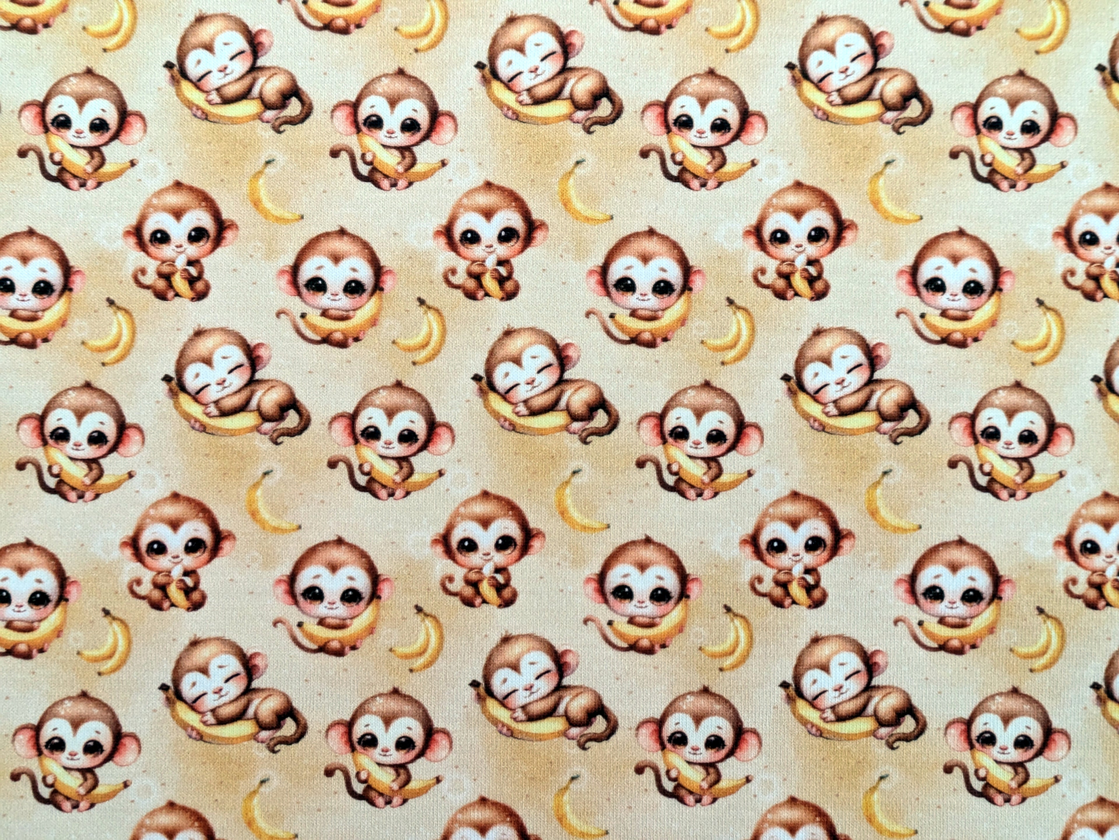 In-house production Cotton jersey Baby monkey and his banana on yellow
