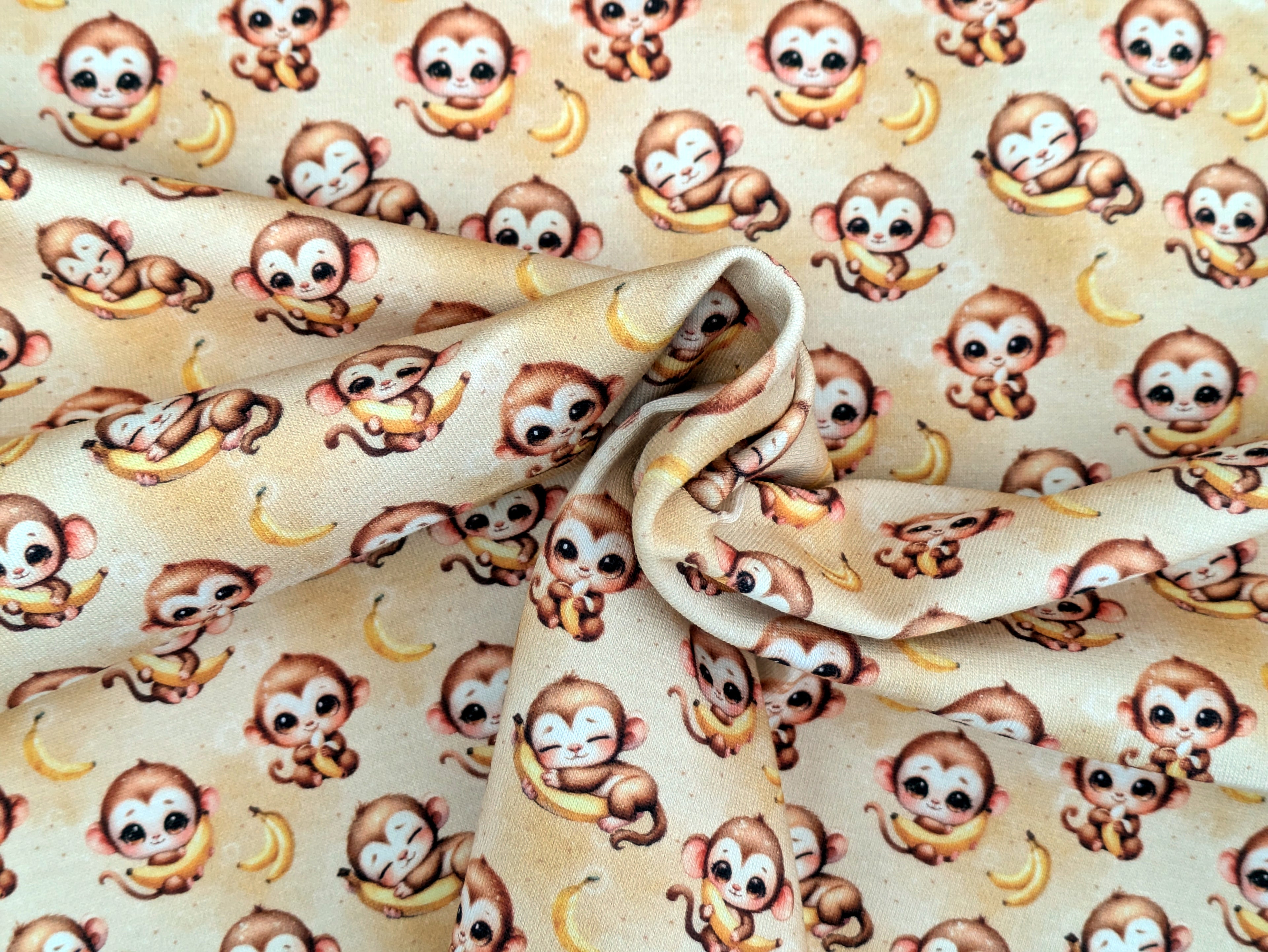 In-house production Cotton jersey Baby monkey and his banana on yellow