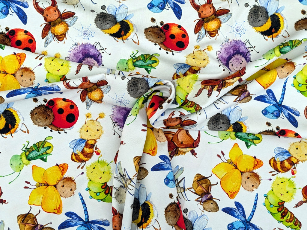 Eigenproduktion Baumwolljersey Insekten Käfer Wiese Weiß