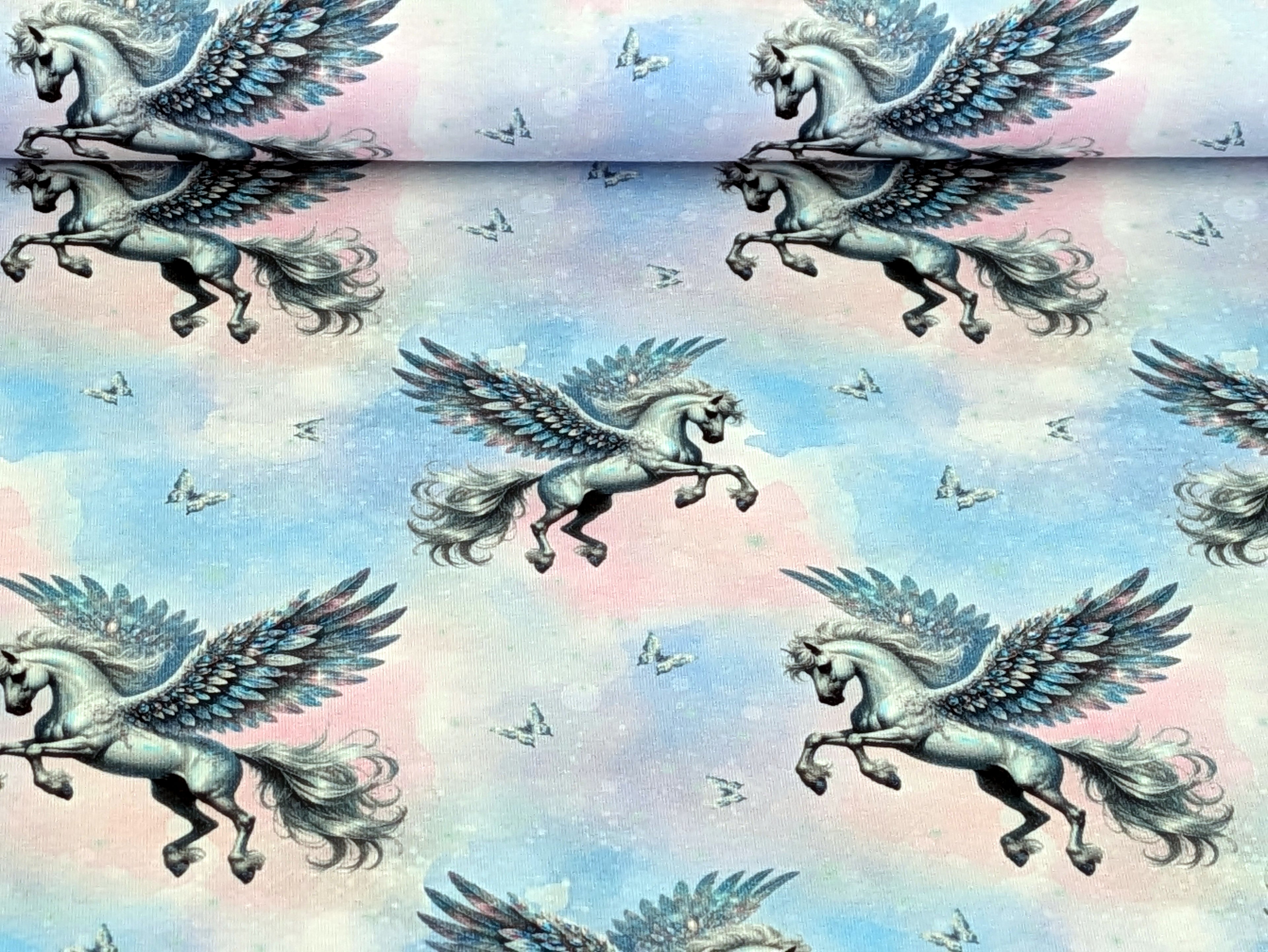 Baumwolljersey Eigenproduktion Pegasus Weiß auf Hellblau