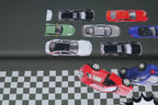 Reststück Baumwolljersey Panel Rennbahn Auto Crash auf Grau 60x150 cm